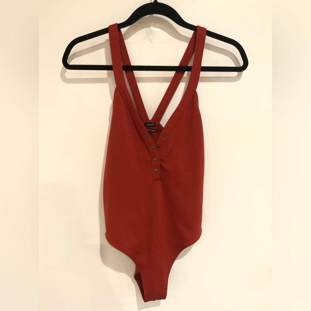 Out From Under Rust bodysuit